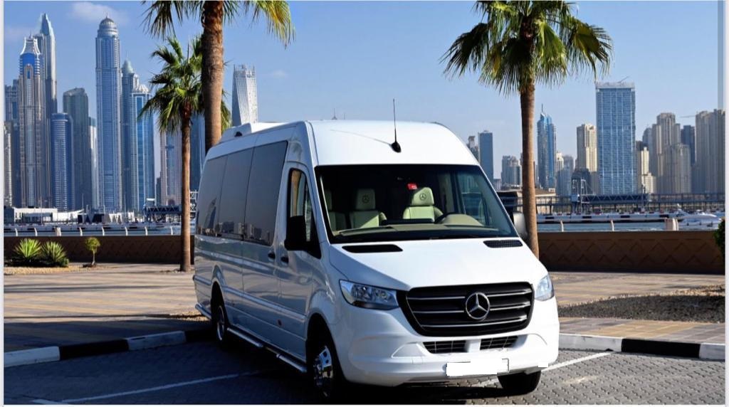 white color mercedes benz sprinter 18 seater front view